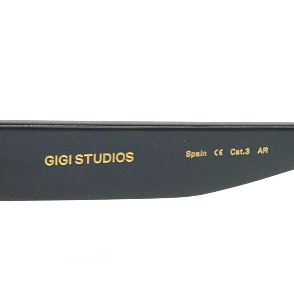 Gigi Studios Sunglasses BITTER 6942/1 Shiny Black Frames Gray Gradient Lenses